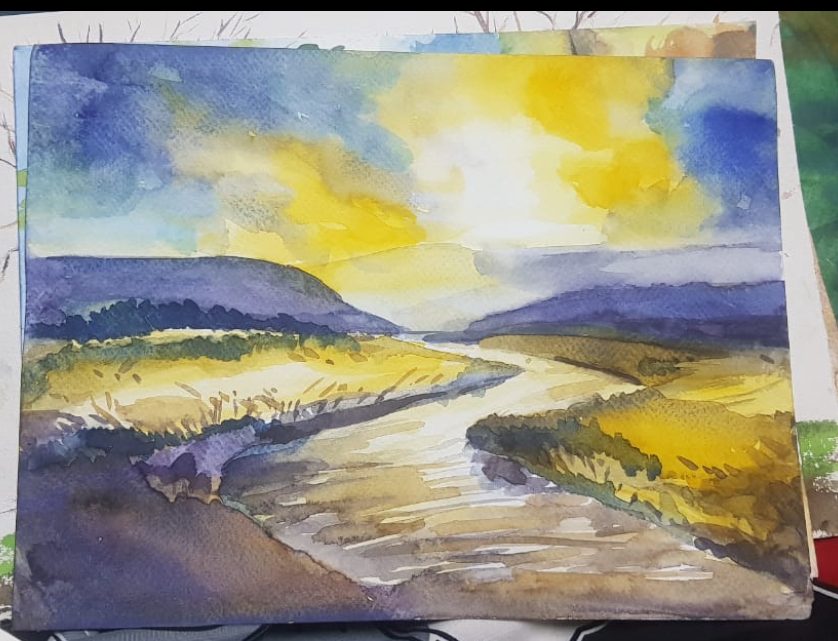 River valley at sunset in yellow and blue